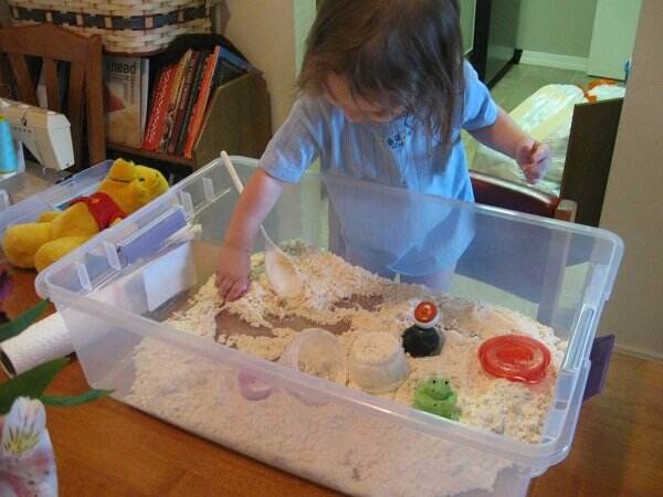 Make a sandbox using oil and flour!